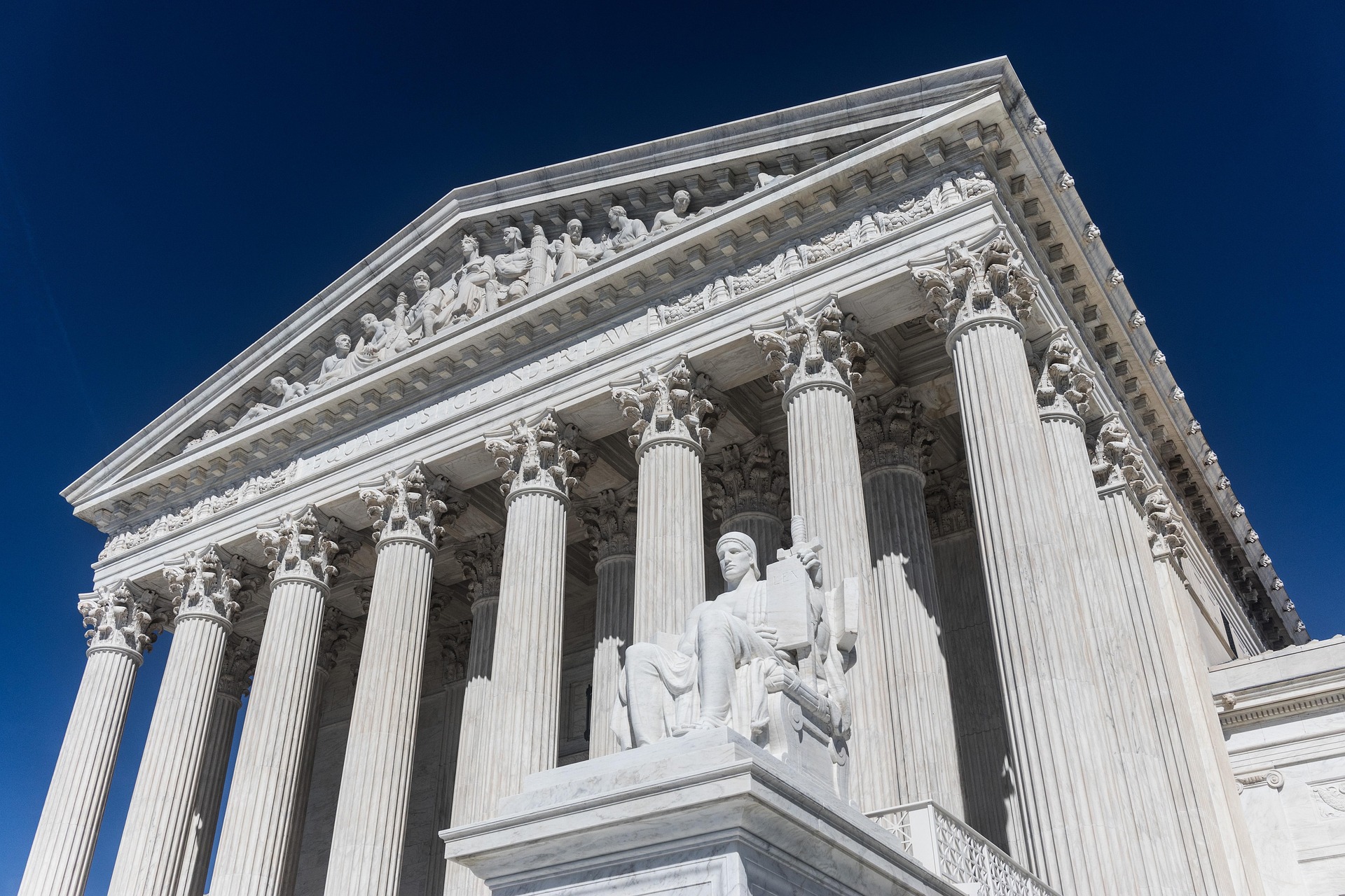 Close-up of the U.S. Supreme Court building representing Section 2 Voting Rights Act enforcement debate.