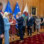 U.S. Attorney General Pam Bondi leads an official oath-taking ceremony at the Department of Justice, with guests and department officials in attendance.